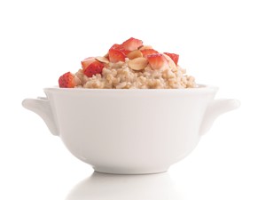 Bowl of Oatmeal with Strawberries and Sliced Almonds