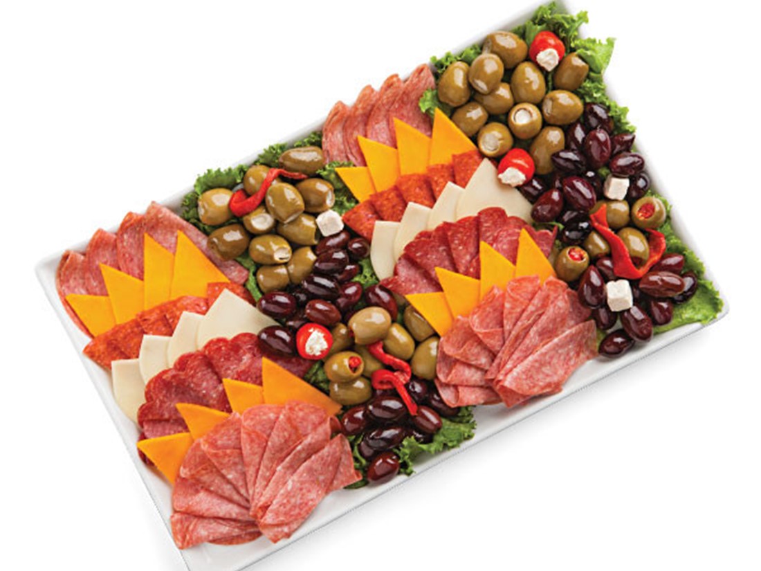 Platter with deli salami, cheese, stuffed olives and red peppers