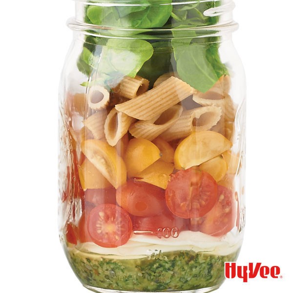 Caprese Pint Jar Salad with Pesto, Tomatoes, Spinach, and Whole Grain Pasta