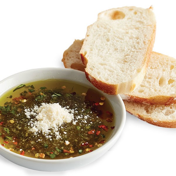 Balsamic Dip with Red Pepper Flakes, Grated Cheese, and Bread Slices