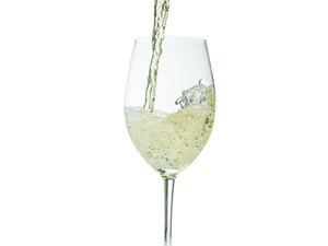 White Wine Pouring into Wine Glass