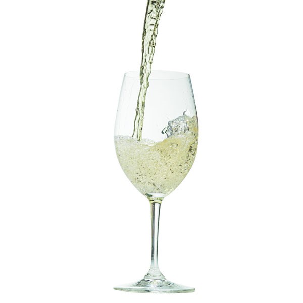 White Wine Pouring into Wine Glass